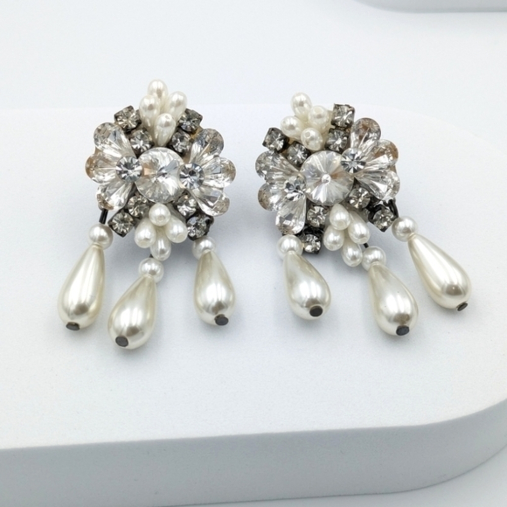 Vintage mid century statement rhinestone and faux pearl clip on earrings.